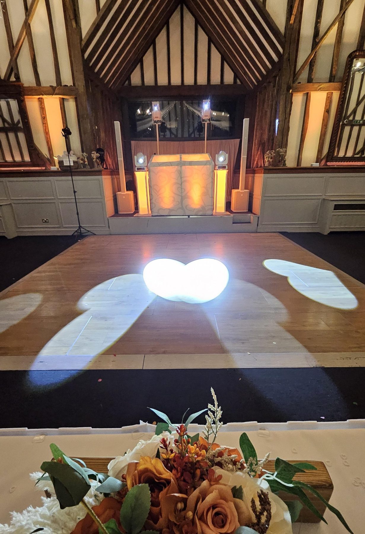 Monogram gobo projected across a barn dance floor